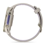 Garmin Forerunner 970 47 мм: серый корпус French Grey и золотистый титановый безель Soft Gold, боковой ракурс с двумя кнопками